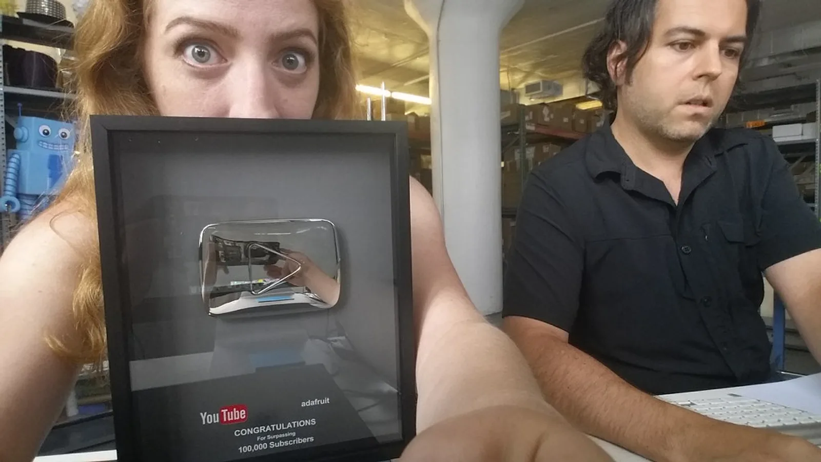 Framed YouTube Play Button Creator Award plaque, the prize behind the most subscribed YouTube channel race